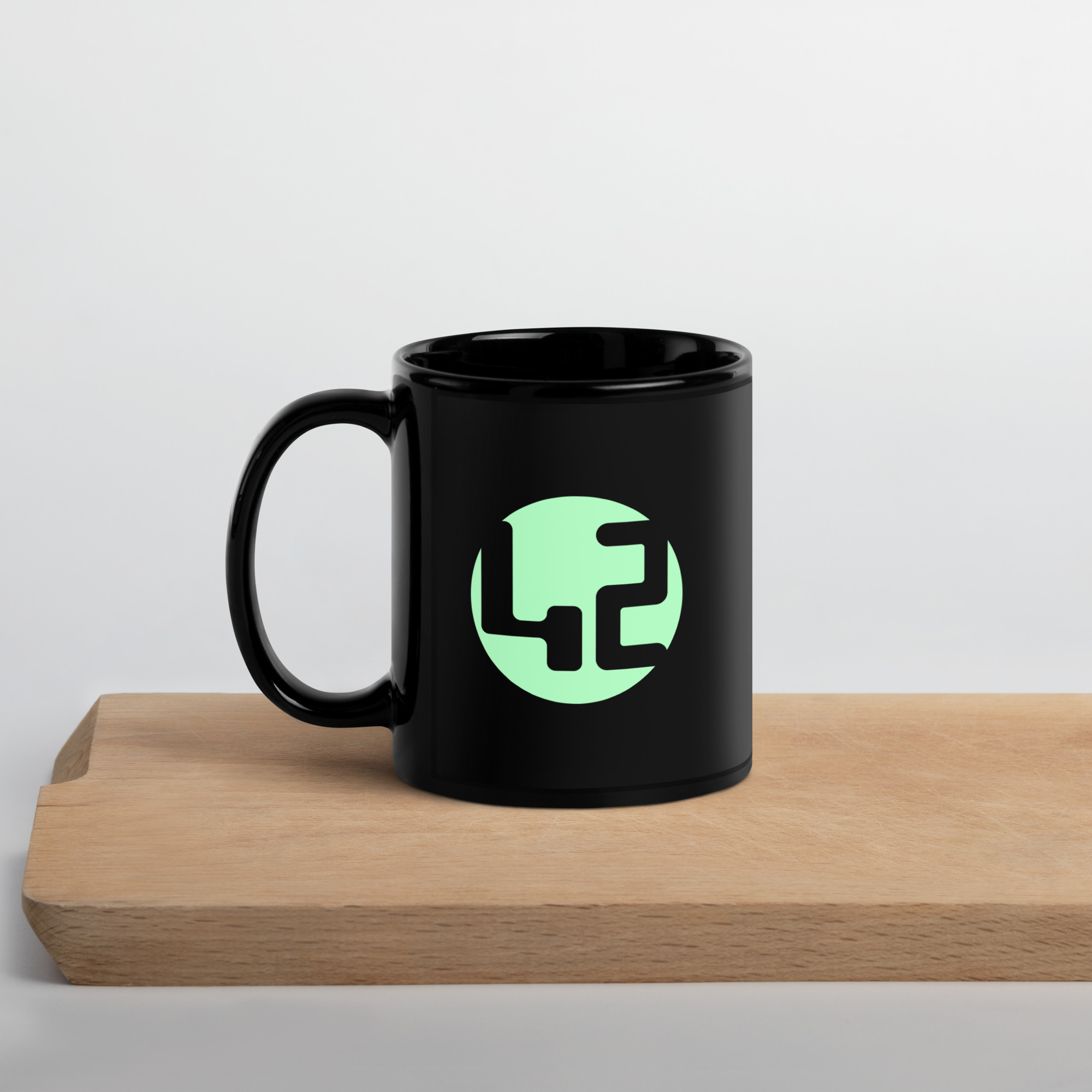 black glossy mug Black mug with green 42 design