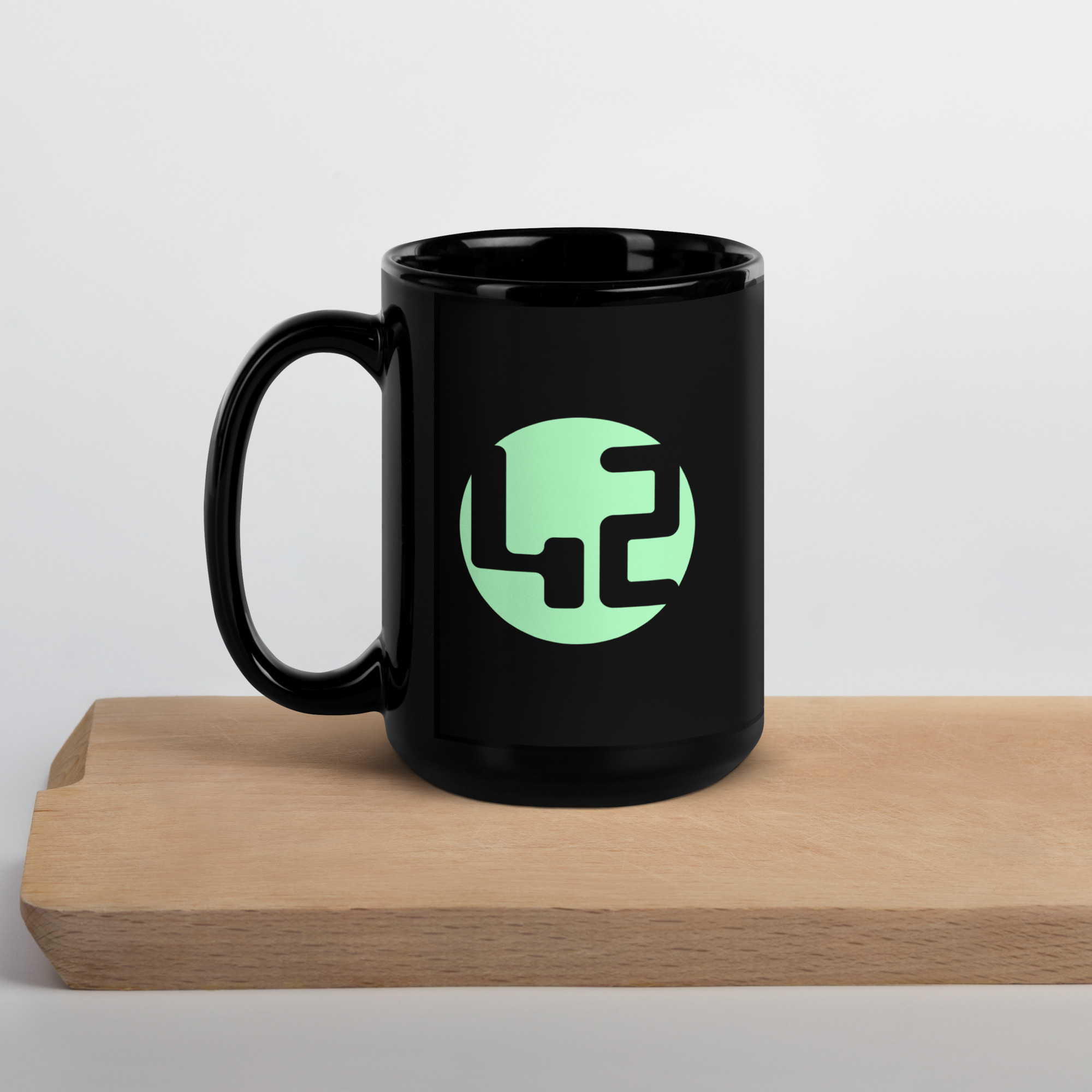 black glossy mug Black mug with green 42.