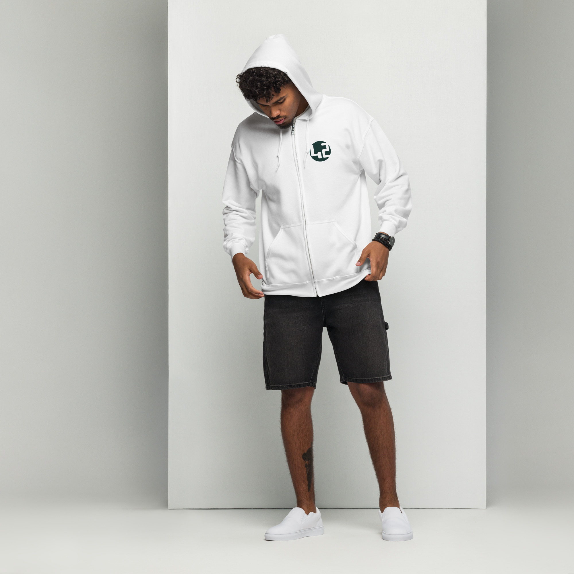 unisex heavy blend zip hoodie Man in white zip-up hoodie