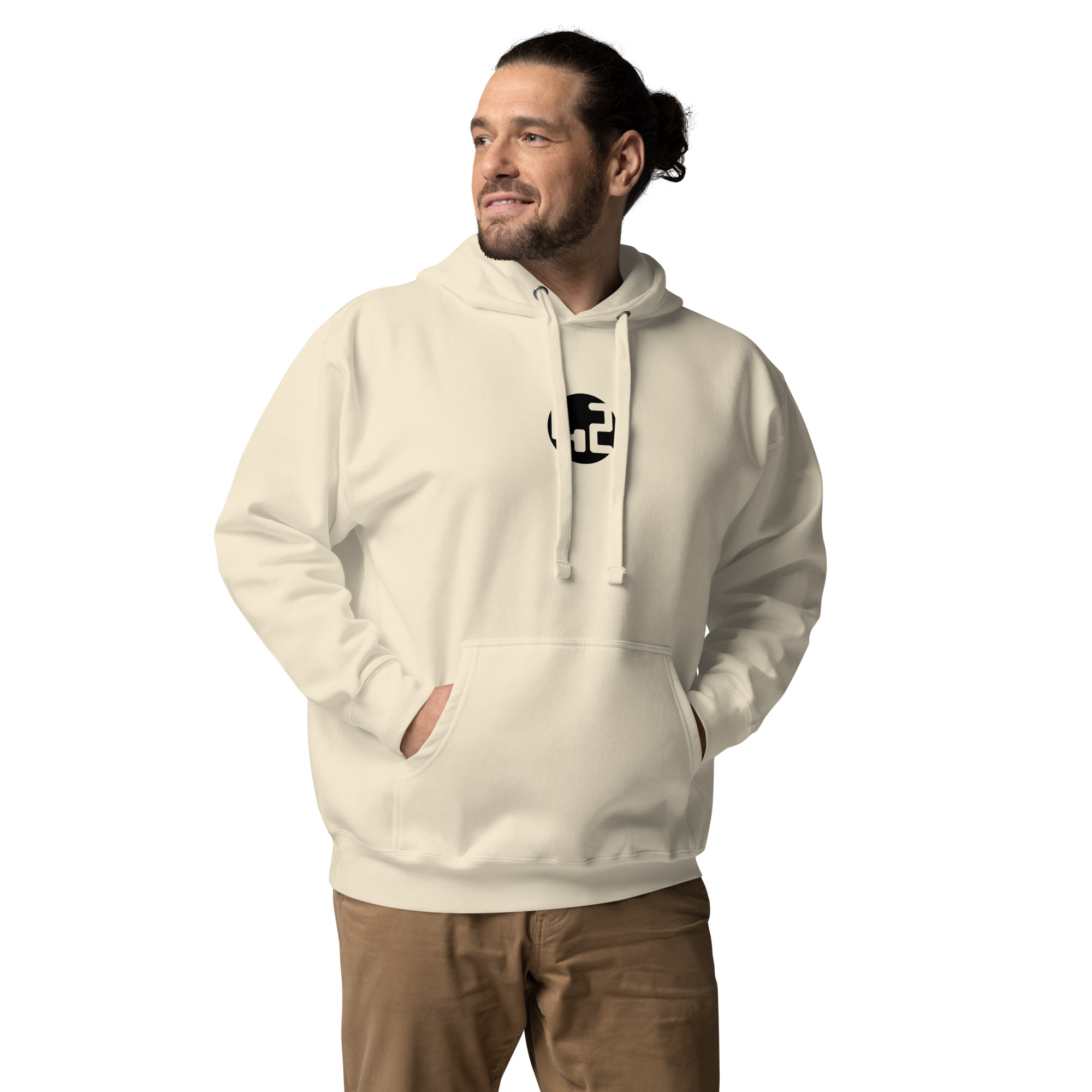 unisex hoodie Man in cream hoodie smiling.
