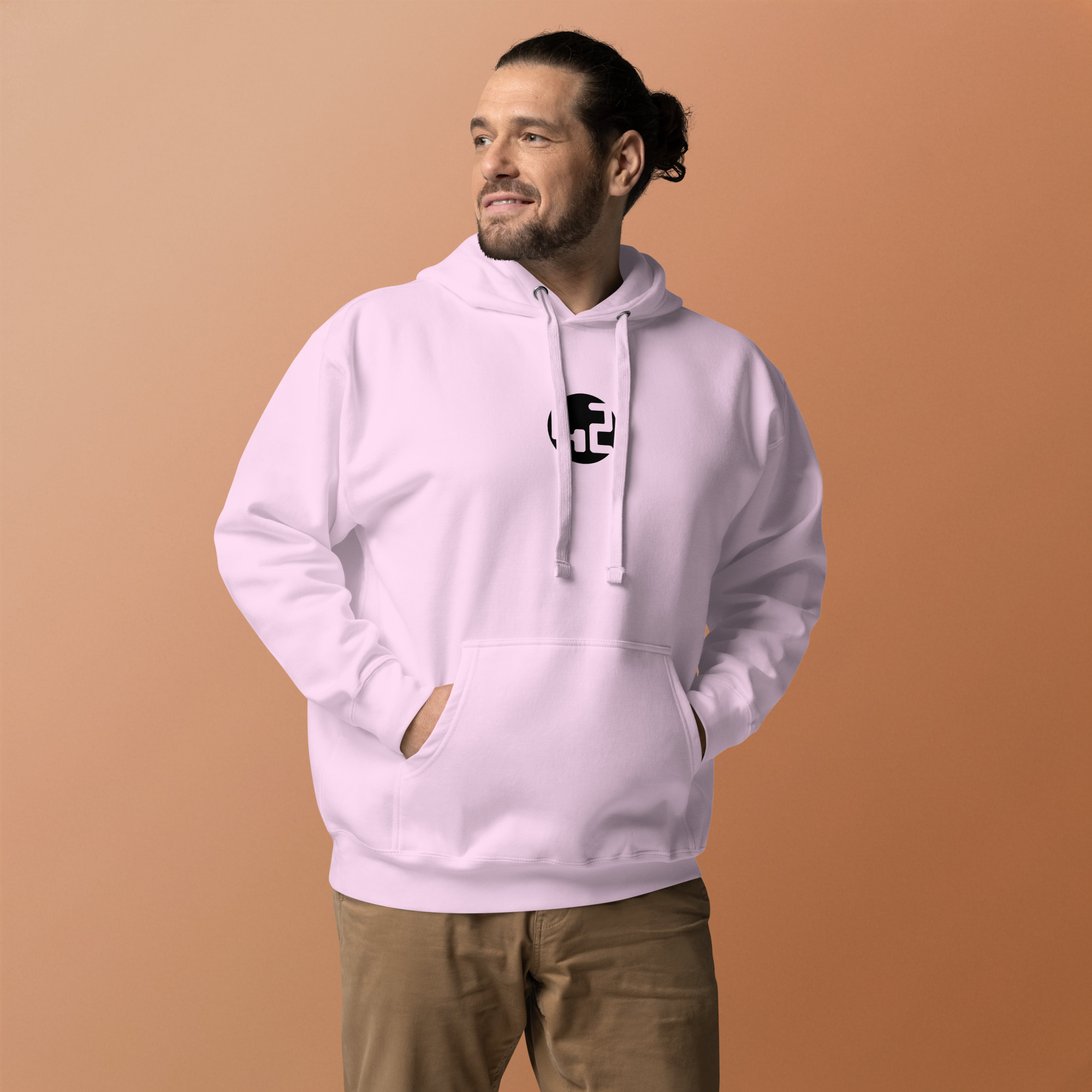 unisex hoodie Man in pink hoodie.