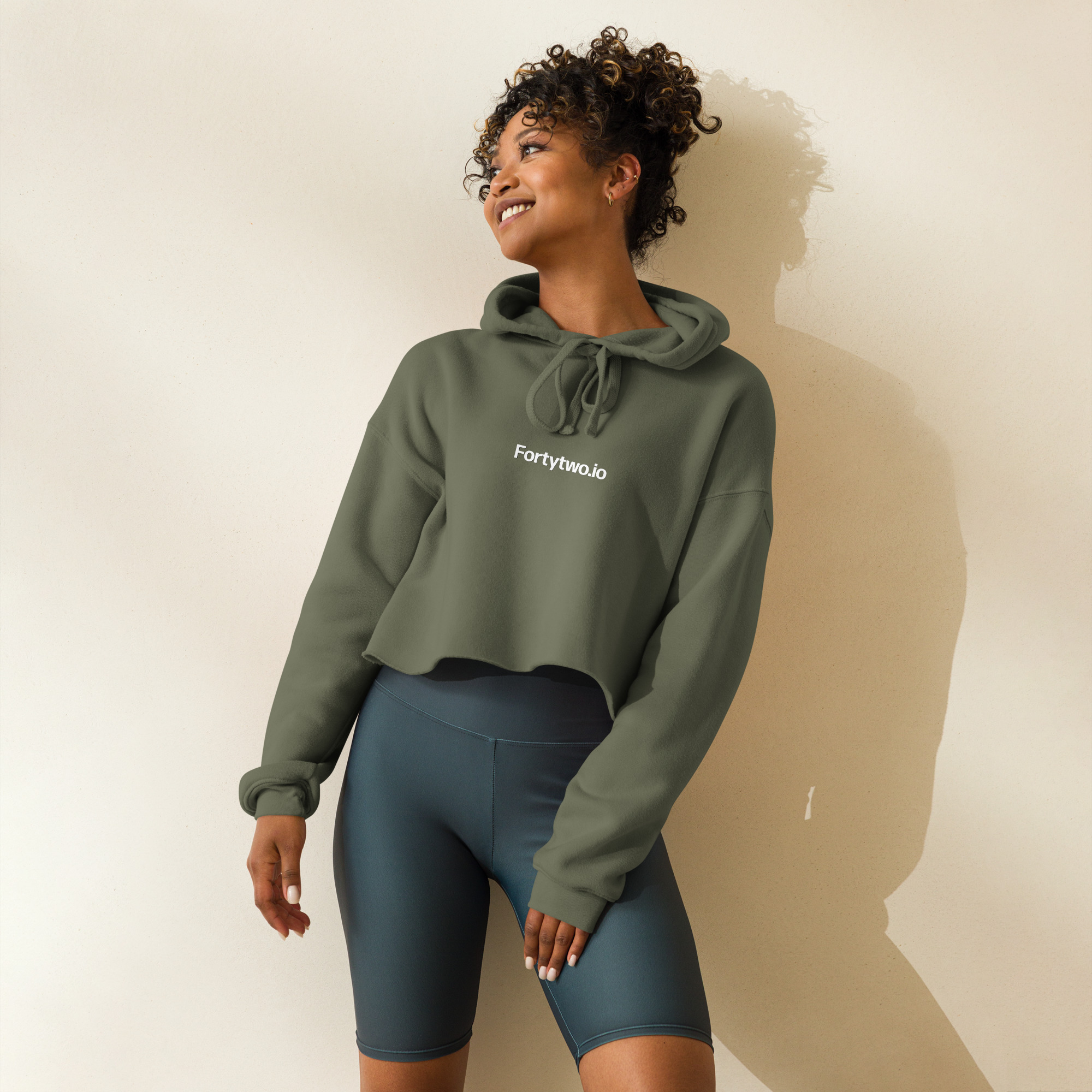 crop hoodie Woman in olive cropped hoodie